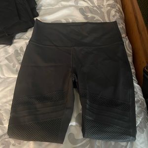EUC rare LULULEMON SIZE 10 dark grey/mesh leggings